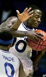 Center Earl Barron grabs a rebound during the second half.