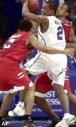 Memphis forward Dajuan Wagner looks for a passing lane during Saturday's 76-73 loss to Houston.
