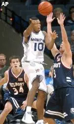 Belmont's Nick Otis (34) and Jese Snyder (3) guard Rodney Carney during the first half.