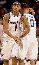 Antonio Burks and Clyde Wade celebrate Memphis' 94-70 win over UAB.