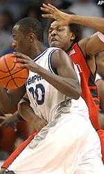 Earl Barron drives to the basket against Cincinnati during the second half.