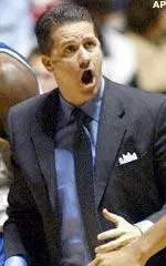 Coach John Calipari shouts instructions from the bench in the second half.