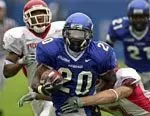 DeAngelo Williams fights through the Houston defense for a 33-yard run during first half Saturday, Oct. 2, 2004, at Liberty Bowl Memorial Stadium in Memphis, Tenn. The run gave Williams the school's all time rushing record. He later broke the school's single game rushing record. (AP Photo/ The Commercial Appeal, Mark Weber)