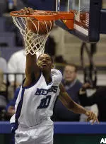 Rodney Carney makes a dunk on the fast break against Louisiana Tech during the first half.