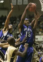 Joey Dorsey comes down with a rebound over Purdue's Brandon McKnight.