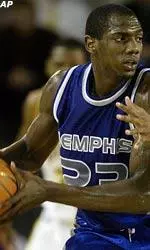 Memphis' Anthony Rice looks to move the ball under pressure against East Carolina.