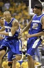 Memphis' Sean Banks celebrates his three-point shot with teammate Antonio Burks. Banks and Burks combined for 45 points.