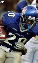 Memphis running back DeAngelo Williams fights for a first down against the East Carolina defense during the fourth quarter. (AP Photo/The Commercial Appeal, Mark Weber)