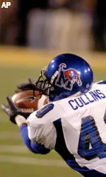 Memphis defensive back O.C. Collins (40) intercepts a pass thrown by Southern Mississippi quarterback Dustin Almond during the second quarter Saturday, Nov. 19, 2005, in Hattiesburg, Miss. (AP Photo/Steve Coleman)