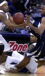 Memphis' Clyde Wade, left, and Waki Williams, bottom, make the steal from Jackson State's Julius Young, right, during the second half. (AP Photo/Lance Murphey)