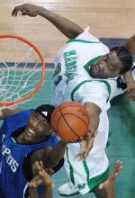 Robert Dozier reaches up for a basket