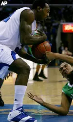 Joey Dorsey steals the ball from Marshall's Robbie Jackson in the first half.