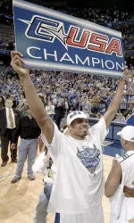 Rodney Carney celebrates Memphis' C-USA title.