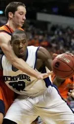 Bucknell center Chris McNaughton, rear, reaches in on Memphis forward Joey Dorsey during the second half. (AP Photo/Donna McWilliam)