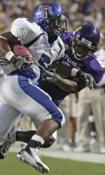 Joseph Doss tries to avoid ECU defenders.