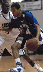 Guard Chris Douglas-Roberts drives past UCF guard Dave Noel during the first half.
