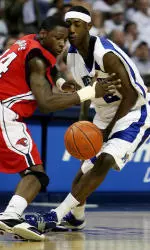 Robert Dozier collides with Houston's Jahmar Thorpe during the first half.