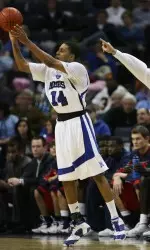 Chris Douglas-Roberts gets off a 3-pointer during the first half.