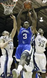 Joey Dorsey pulls down a rebound during the first half.