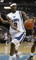 Memphis forward Robert Dozier (2) looks for the ball between East Carolina's James Legan, left, John Fields (23) and Brandon Evans (34) in the first half (AP Photo)