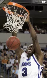 Memphis forward Joey Dorsey stuffs the ball against Mississippi State. (AP Photo/Danny Johnston)