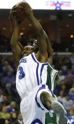 Joey Dorsey fights for a rebound with UAB forward Frank Holmes in the first half. (AP Photo/Lance Murphey)