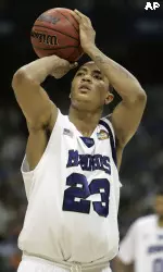 Derrick Rose shoots a free throw in the second half against Kansas. (AP Photo/Mark Humphrey)