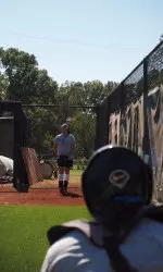 Senior pitcher Vanessa Walle warms up in the Tiger bullpen as the team worked together for the first time this fall.
