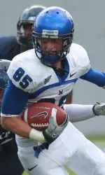 While away from college football for nearly three years, Rehrer worked as a baseball umpire, phone salesman and restaurant bus boy to support his family.