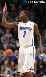 Antonio Barton's triple with three seconds remaining lifted Memphis past UCF, 63-62.