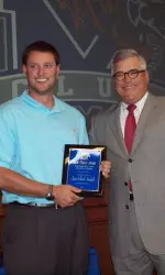 Ryan Holland was presented the Zach Curlin Award by associate athletic director Bob Winn