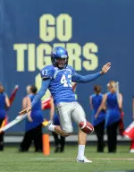 Tom Hornsey's 61-yard pass to Bobby McCain on a fake punt set up a Tigers touchdown.
