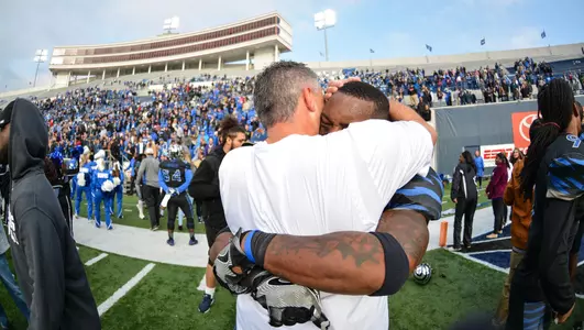 Coach Mike Norvell and Arthur Maulet