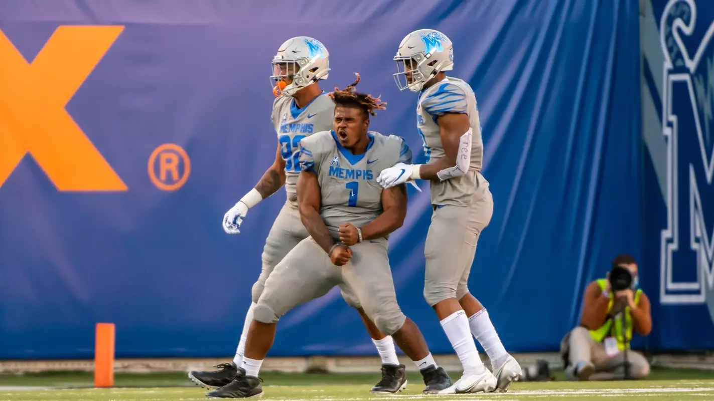 3 players celebrating