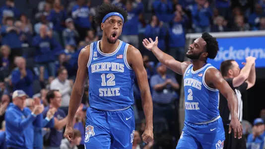 DeAndre Williams and Alex Lomax celebrating