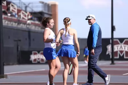 coach talking to girls at mississippi state