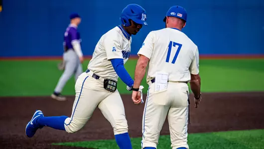 Pierre Seals, Matt Riser HR celebration, Feb. 21, 2024 - Home Opener at FedExPark Avron Fogelman Field