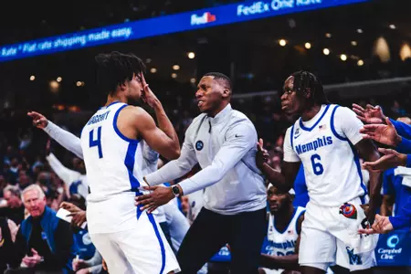 PJ Haggerty, Nolan Smith, Baraka Okojie celebration