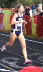 Freshman Becky Clark set a new school record with a time of 5:14.05 in the one-mile run.