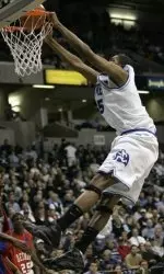 Derrick Brown converts on one of his three dunks vs. Detroit.