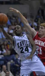 Drew Lavender led the way with 13 points and five assists as No. 24 Xavier was upset by Creighton on Saturday night in Omaha.