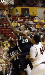 Forward C.J. Anderson drives to the basket past Arizona State guard Jerren Shipp (44) as forward Jason Love looks on . (AP Photo/Paul Connors)
