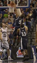 Derrick Brown and the Xavier Musketeers advance to the second round of the 2007 NCAA Tournament with a 79-77 win over BYU.