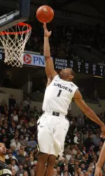 Holloway's triple-double leads Xavier to victory in the Skip Prosser Classic on Saturday night.