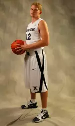 Redford displays Xavier's new uniform.