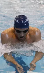 Senior Nathan Green took first in three individual races.