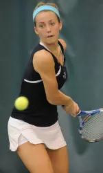 Freshman Andrea Wolf and the Musketeers earned Xavier's lone singles win against Charlotte in the consolation round of the Atlantic 10 Tournament.