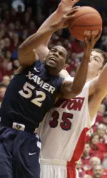 Holloway scored 14 of his 21 points in the second half for Xavier.
