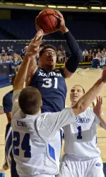 Isaiah Philmore puts up a shot against Drake.