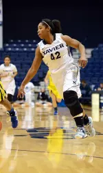 Lakeisha Crouch earned a double-double as the Xavier women's basketball team defeated UNCW 62-52 Tuesday night at Cintas Center.